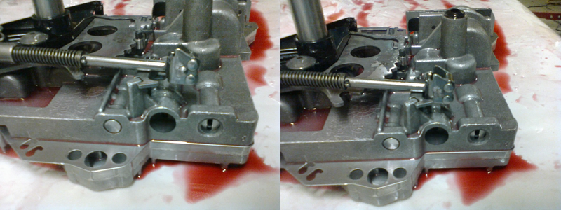 Close-up of the park rod. This rod has been flopping around, and in order to secure it during VB installation, there’s a little tab that needs to hook in under this piece. To do this, we line up the head of the rod and shift the manual shaft one click PAST Low gear. This position is impossible to attain with the shifter linkage attached, and only exists to facilitate assembly & disassembly of the transmission.